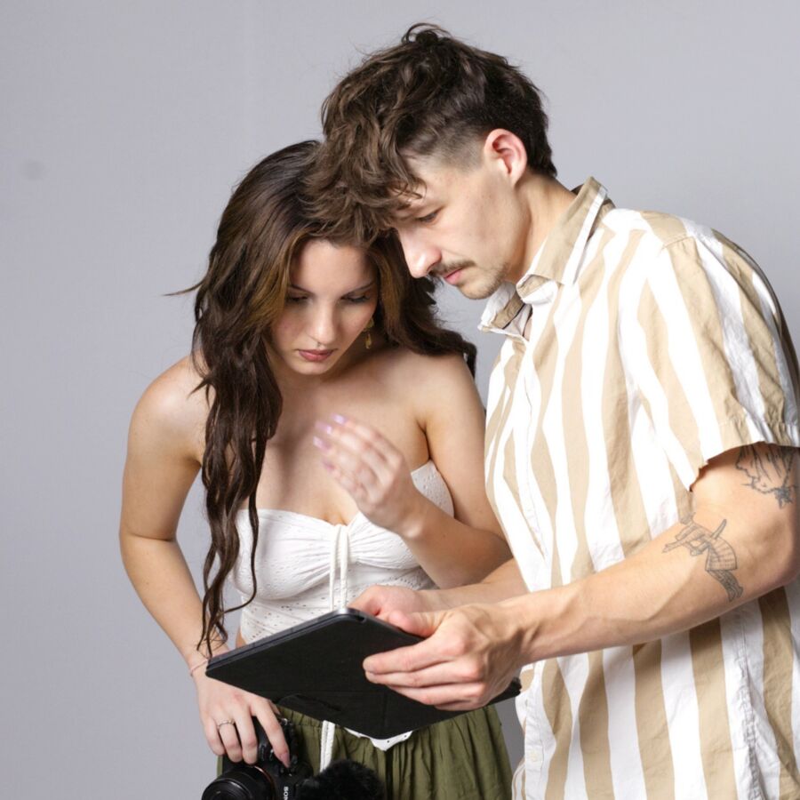 Jake and Kayleigh reviewing content together on an iPad