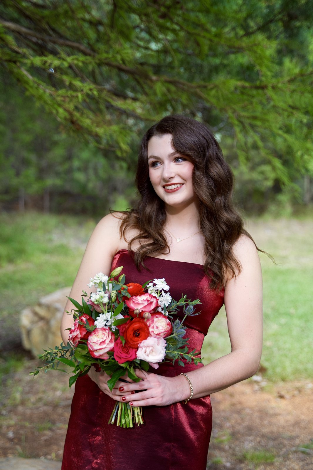 A homecoming portrait with a bouquet