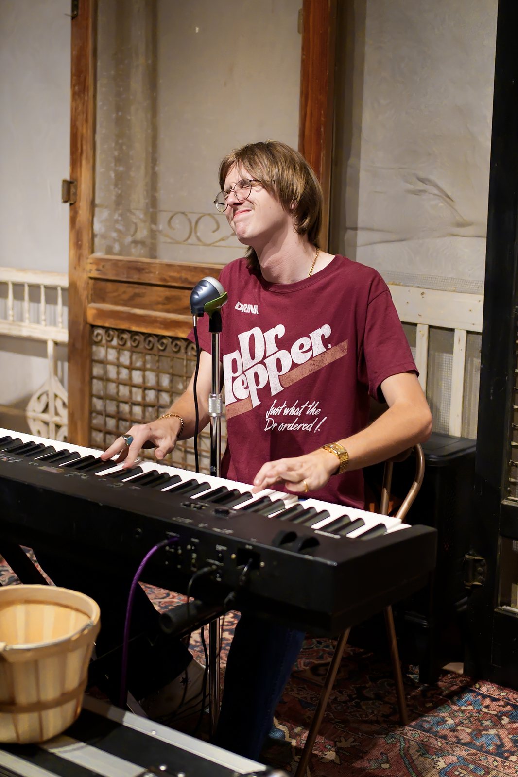 Jack Fishback smiling at the keys