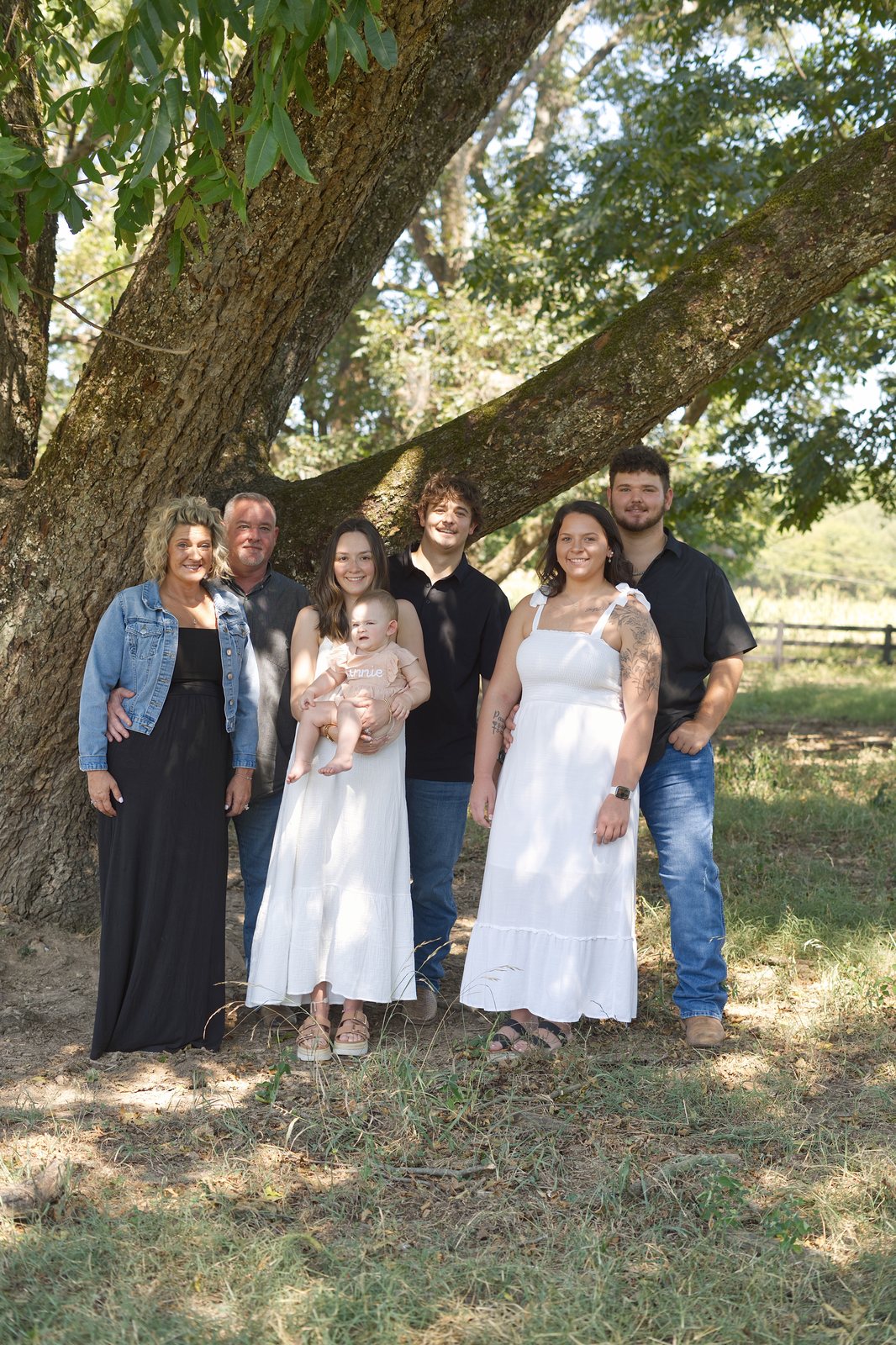 The Shannon family under an oak tree
