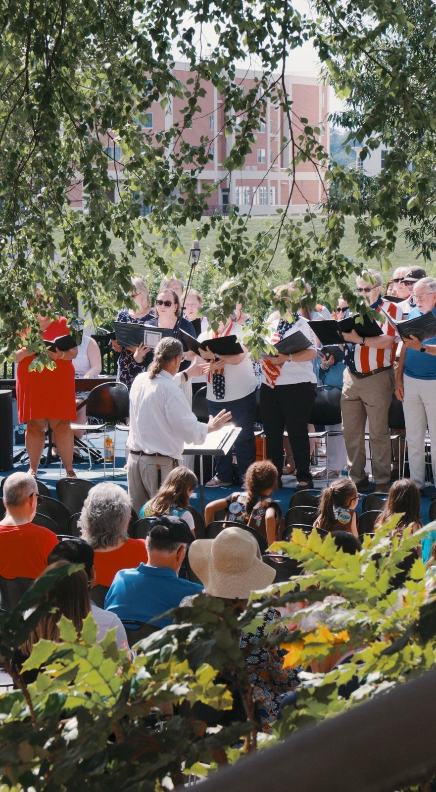 The Three Rivers Singers performing outdoors at Songs of America